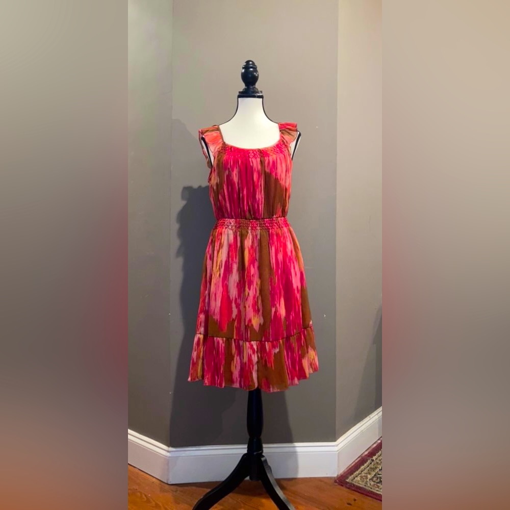 Hasn’t been worn in a couple years perfect condition colorful summer dress.